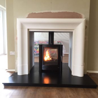 Firbelly FB1 Double sided Woodburning stove with Chancery Agean Limestone Surround Wood burners
