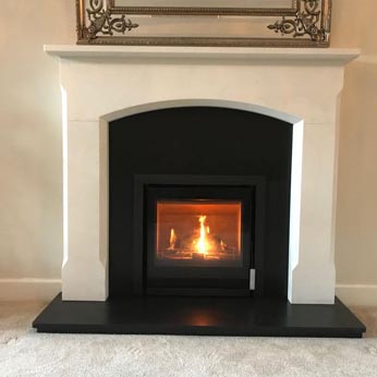 Westfire Inset stove with Bellingham Agean Limestone surround