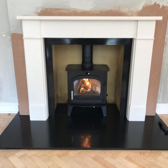 Norroskoven Cleanburn 5Kw  Hersham Agean Limestone surround